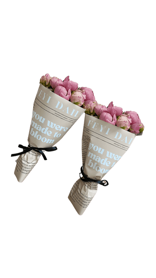 Two peony bouquets wrapped in newspaper, perfect for sharing with a friend from FeYi Flowers.